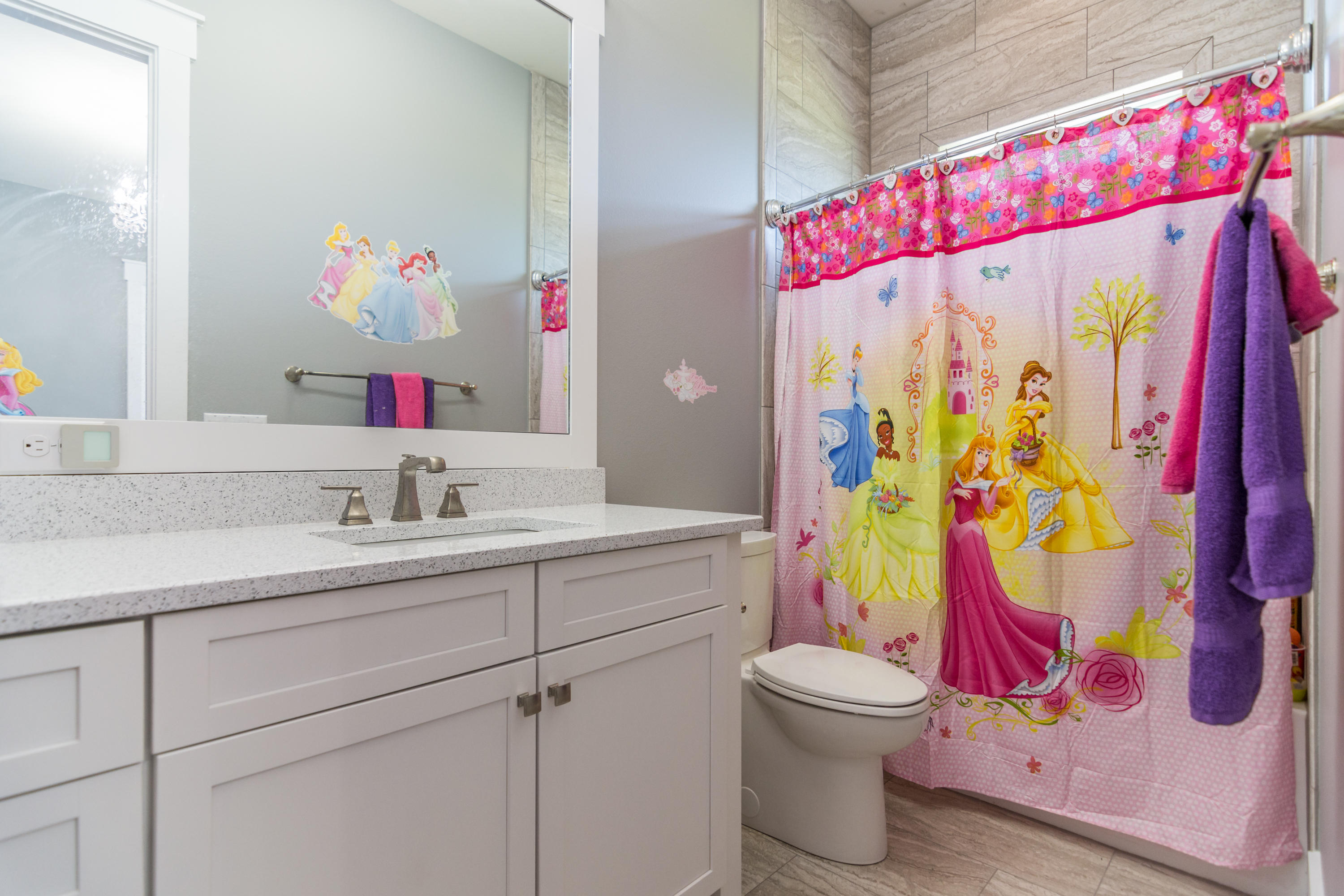1738 Vinson Ray Road Baker, FL 32531 - Photo 30 of 50 a bathroom with a sink mirror vanity and toilet