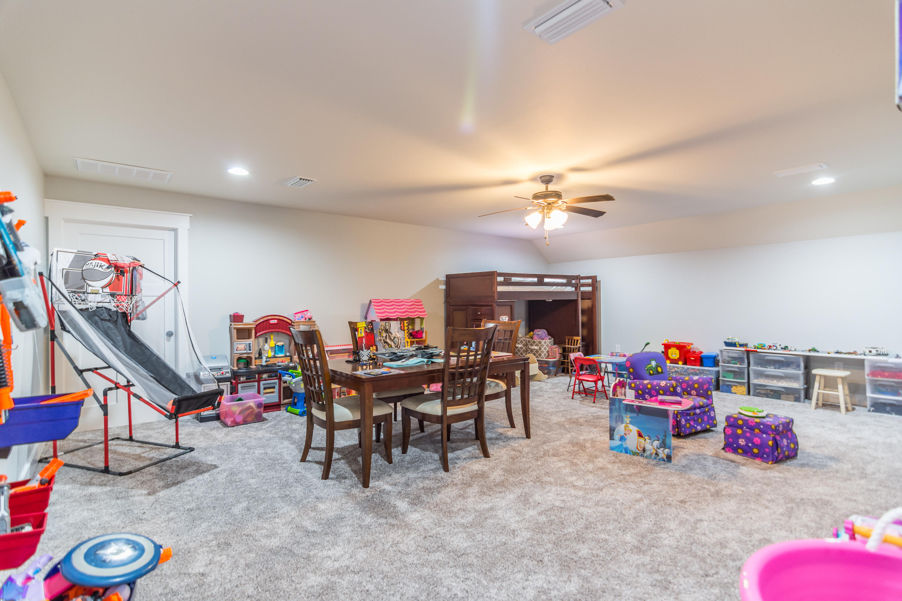 1738 Vinson Ray Road Baker, FL 32531 - Photo 35 of 50 a view of a play room with furniture and toys