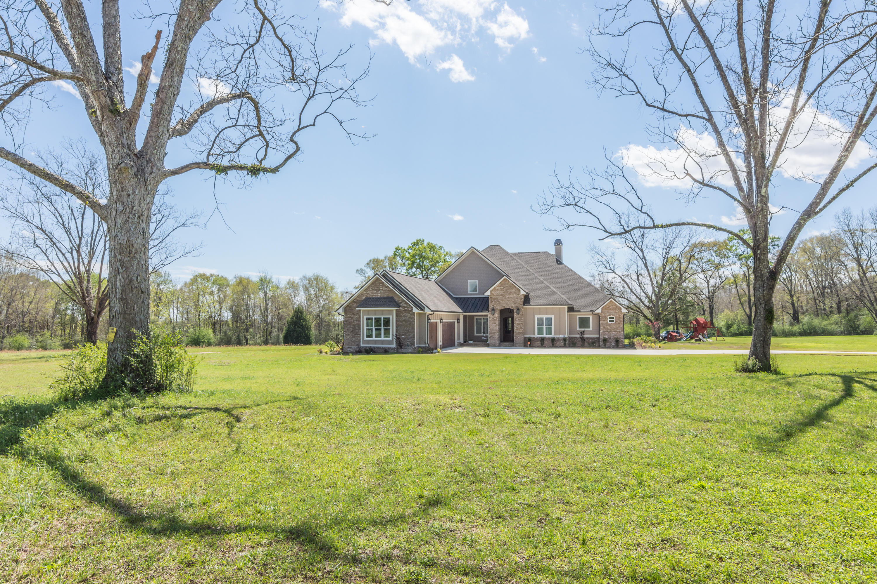 1738 Vinson Ray Road Baker, FL 32531 - Photo 37 of 50 a front view of a house with a yard