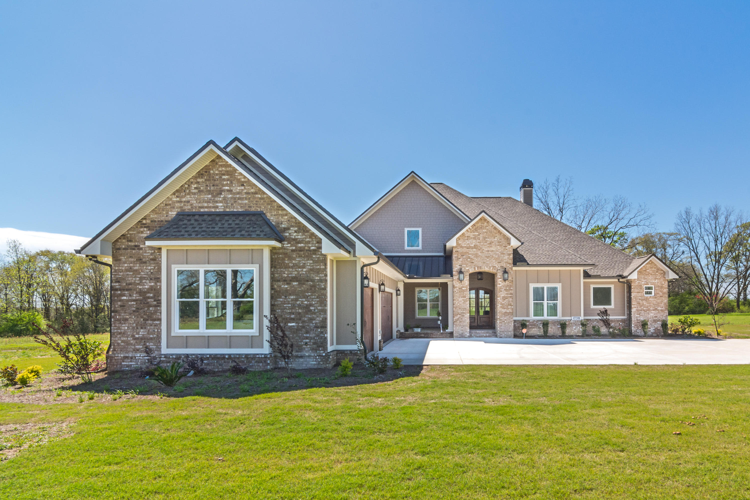 1738 Vinson Ray Road Baker, FL 32531 - Photo 4 of 50 a front view of a house with a yard