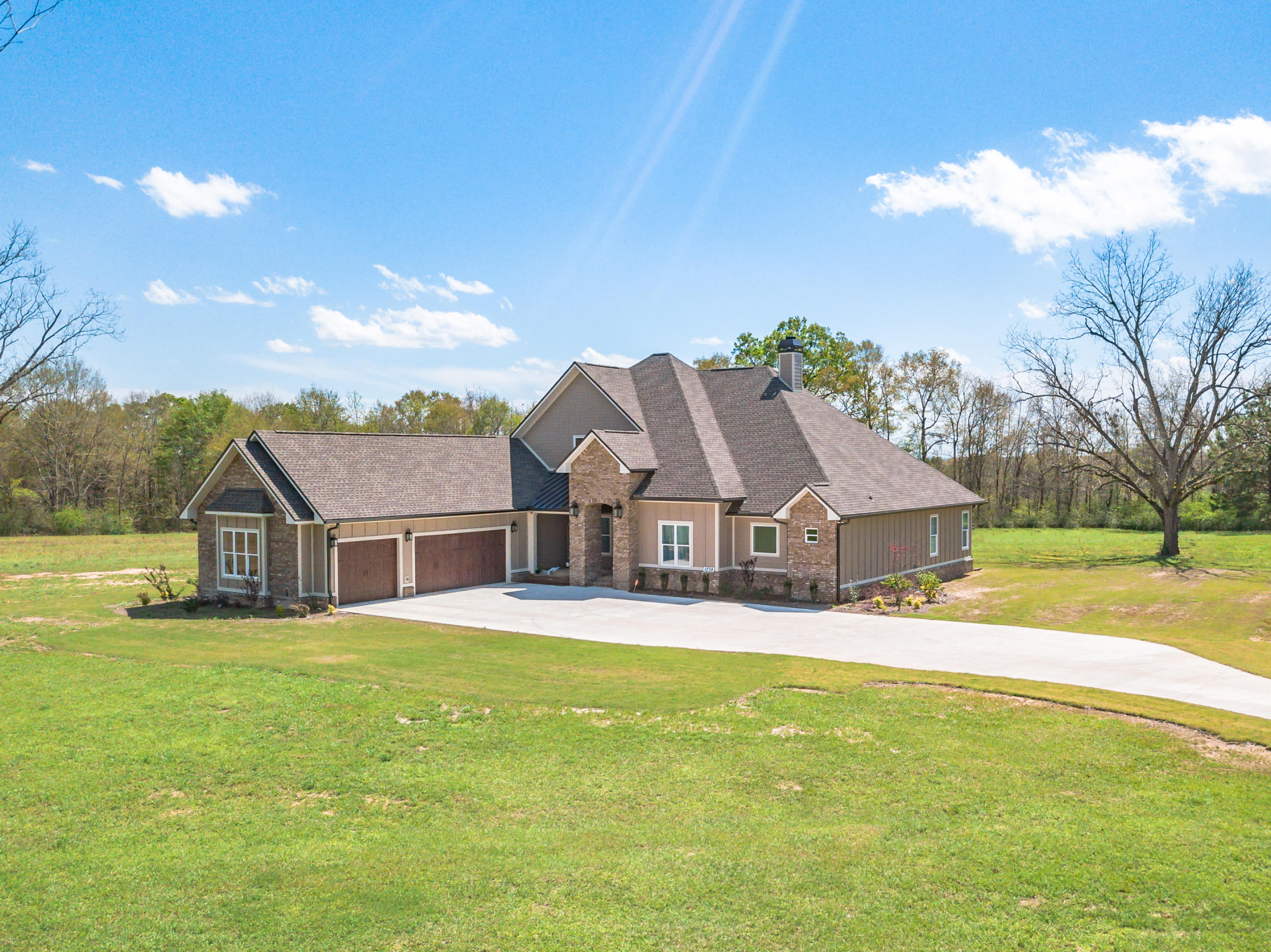 1738 Vinson Ray Road Baker, FL 32531 - Photo 5 of 50 a view of a house with a big yard and large trees