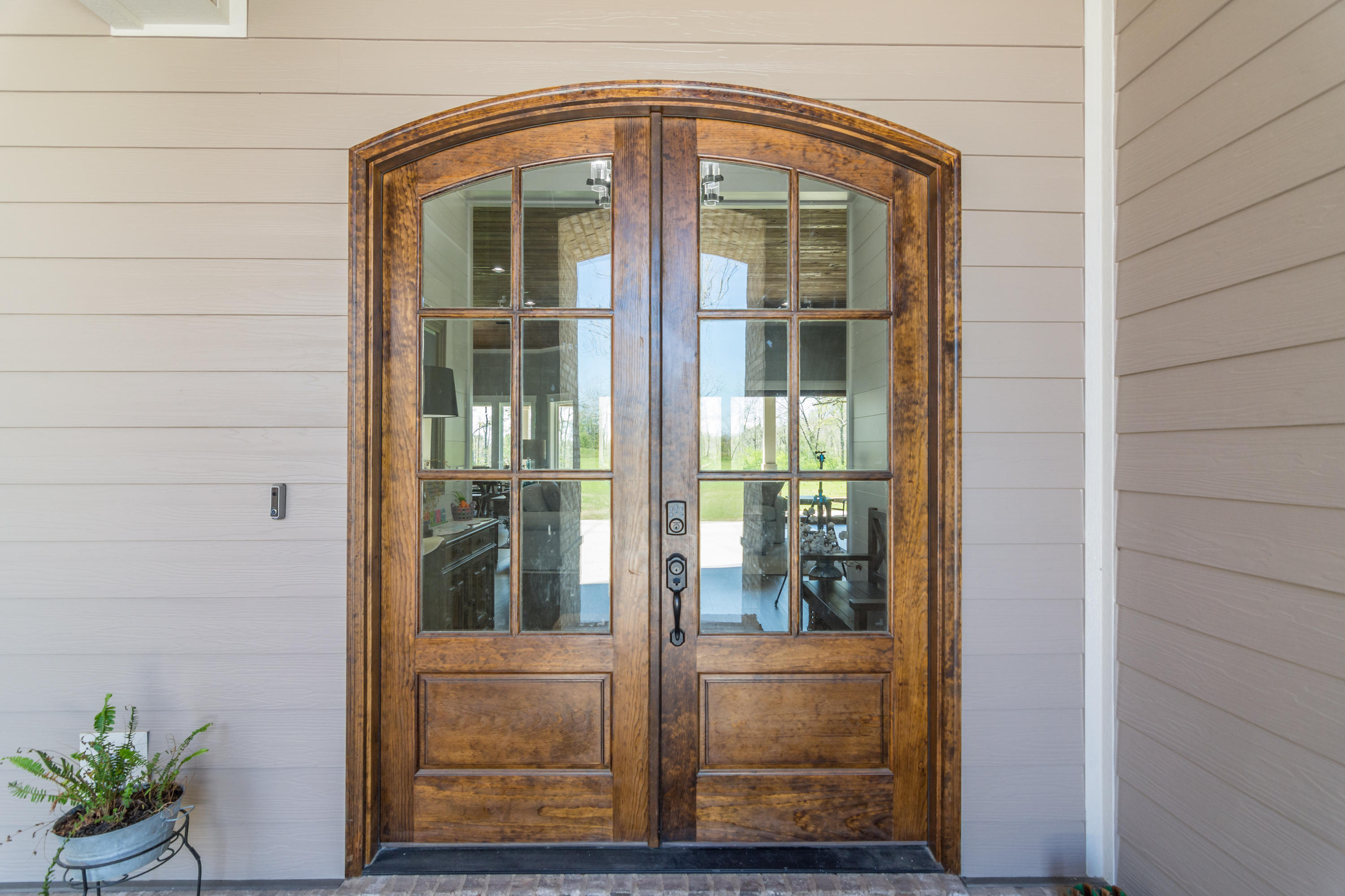 1738 Vinson Ray Road Baker, FL 32531 - Photo 8 of 50 a view of a glass door with a glass door