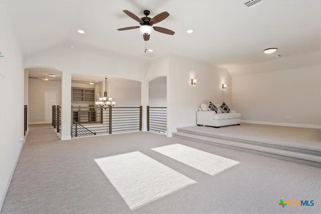 a bathroom with a sink mirror and vanity