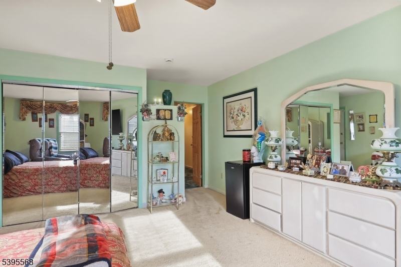 32 Ruby Street Springfield, NJ 07081 - Photo 14 of 31 a living room with furniture and a chandelier