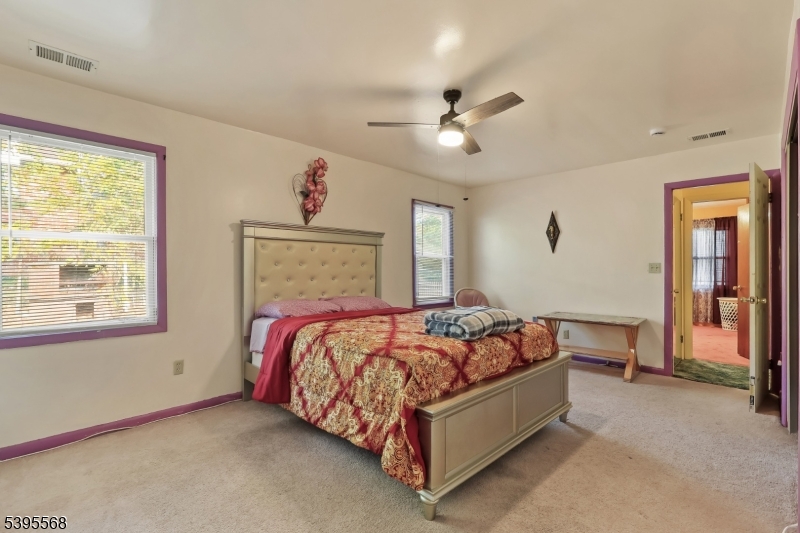 32 Ruby Street Springfield, NJ 07081 - Photo 20 of 31 a bedroom with a bed rug and window