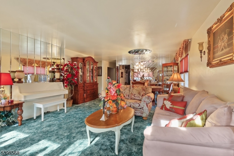 32 Ruby Street Springfield, NJ 07081 - Photo 6 of 31 a view of a livingroom with furniture and a kitchen