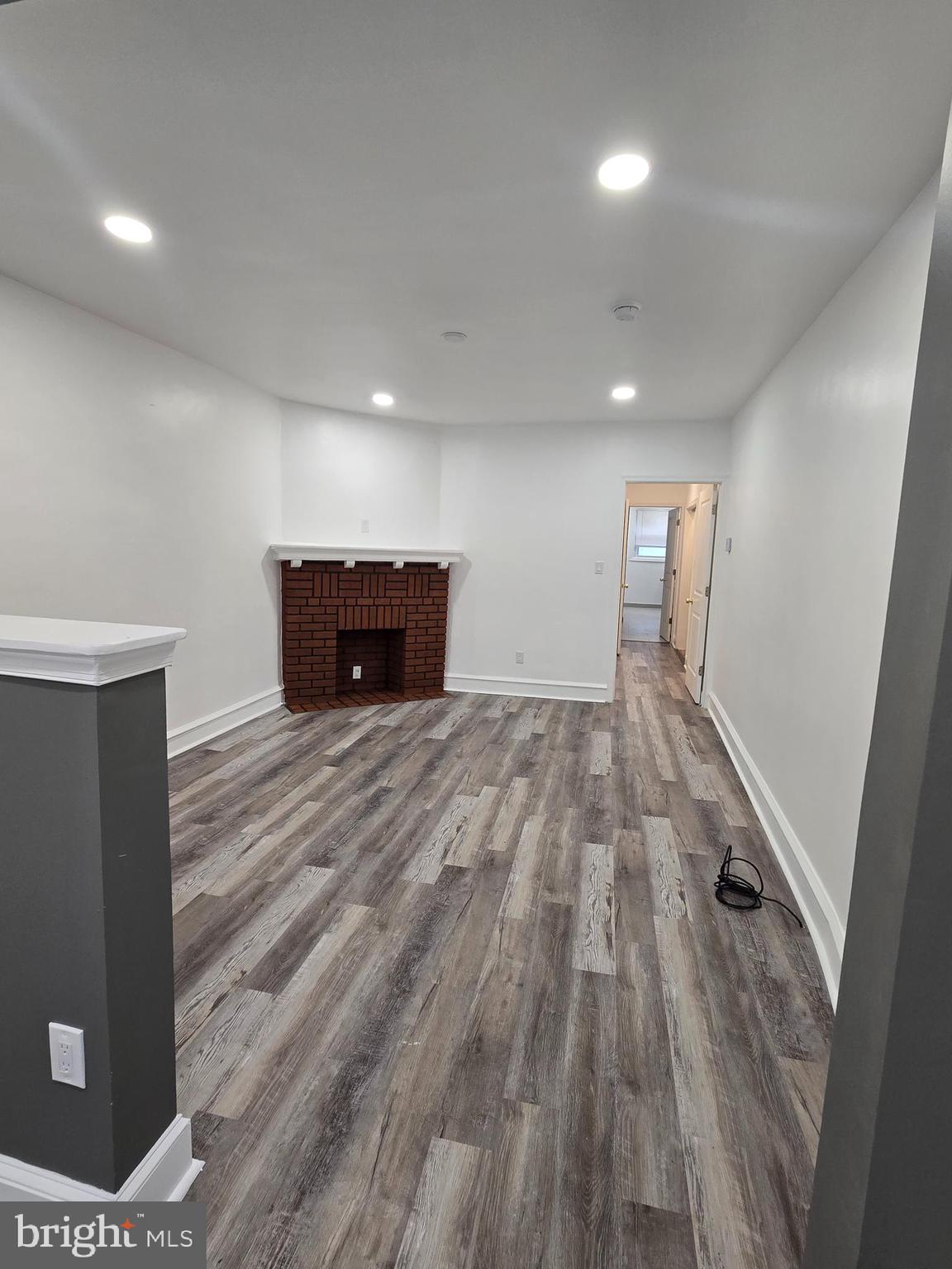 3513 Vista Street Philadelphia, PA 19136 - Photo 3 of 10 wooden floor in an empty room with a window