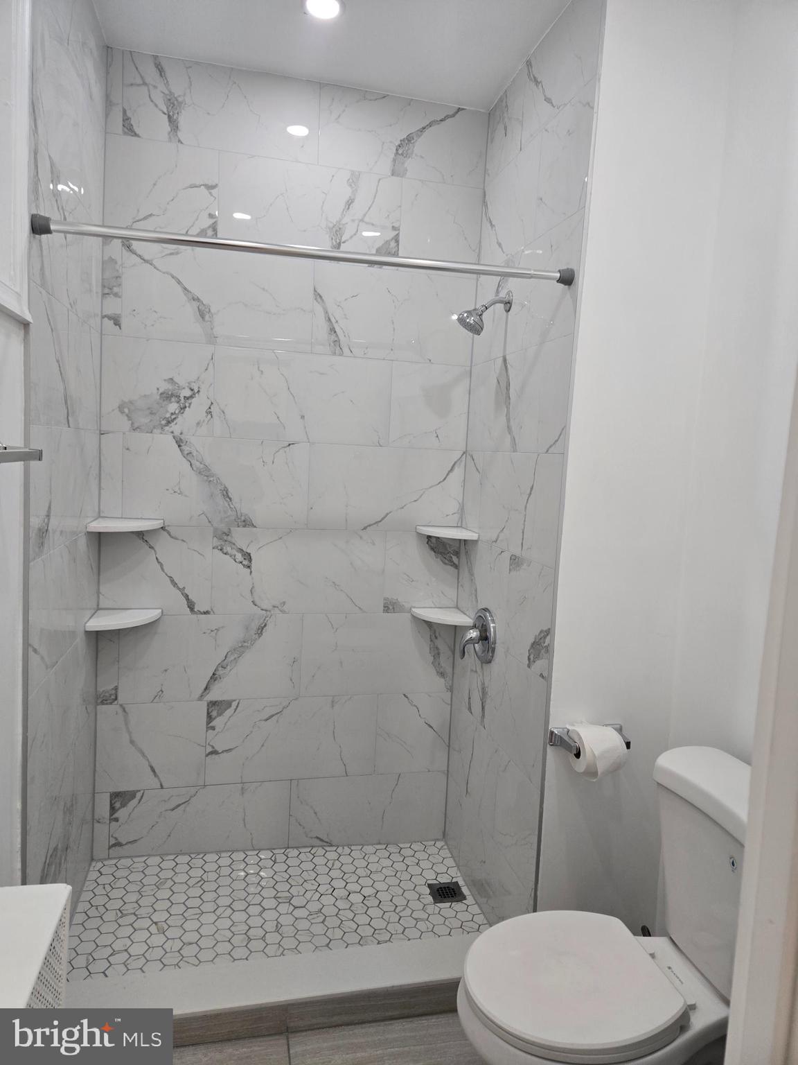 3513 Vista Street Philadelphia, PA 19136 - Photo 10 of 10 a bathroom with a toilet and a shower
