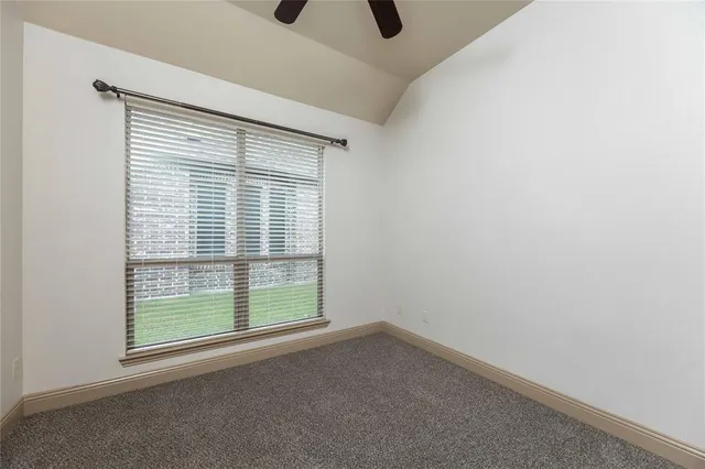 a view of a room that has a window in it