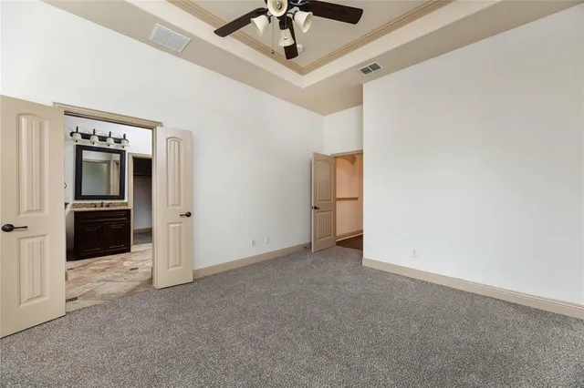 a view of a livingroom with a kitchen