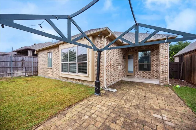 a view of a backyard with a garden
