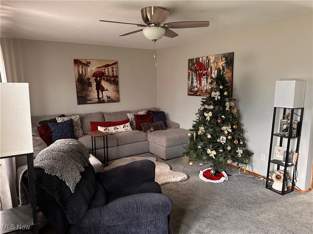 4034 Meister Road Lorain, OH 44053 - Photo 4 of 15 Living room featuring carpet and ceiling fan