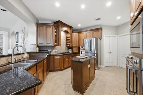 $699,000 | 10111 Earlington Manor Drive, Spring, TX 77379