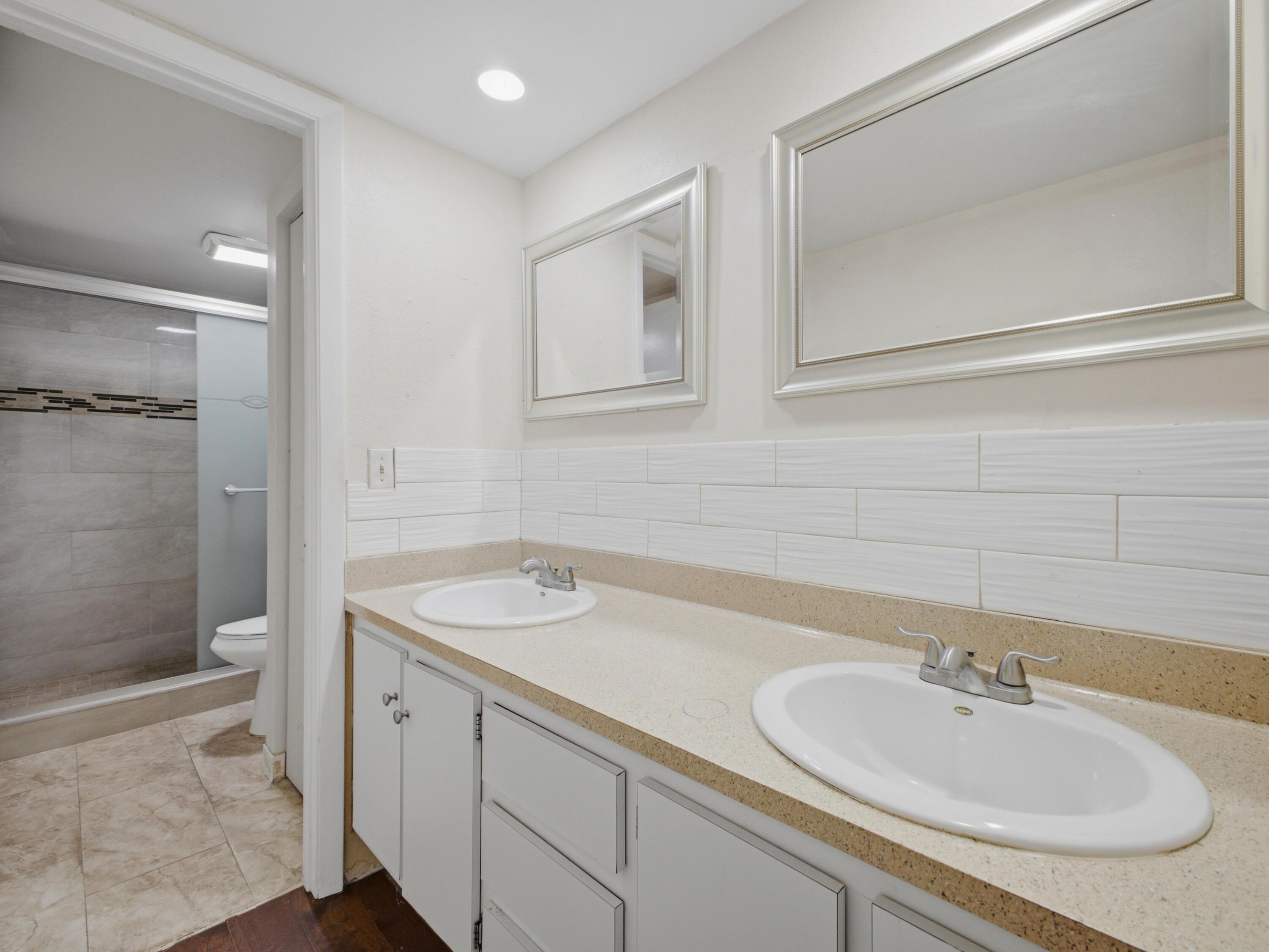 105 Woodland Road Palm Springs, FL 33461 - Photo 39 of 44 Primary Bathroom