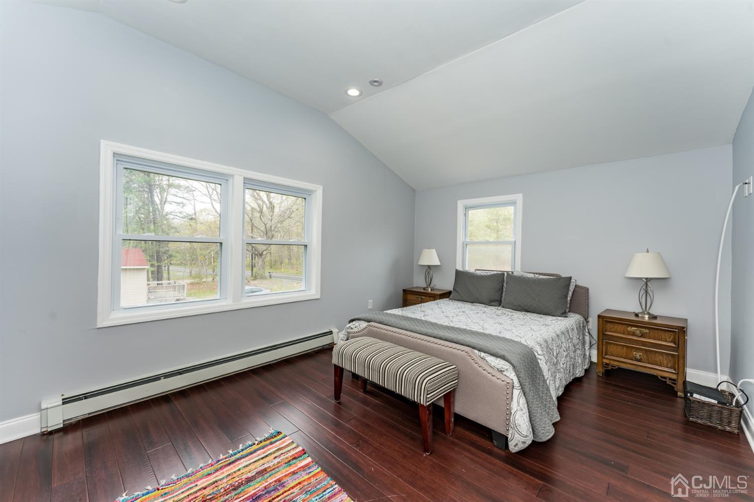 259 Spring Valley Road Morganville, NJ 07751 - Photo 21 of 36 a bedroom with a bed and a window