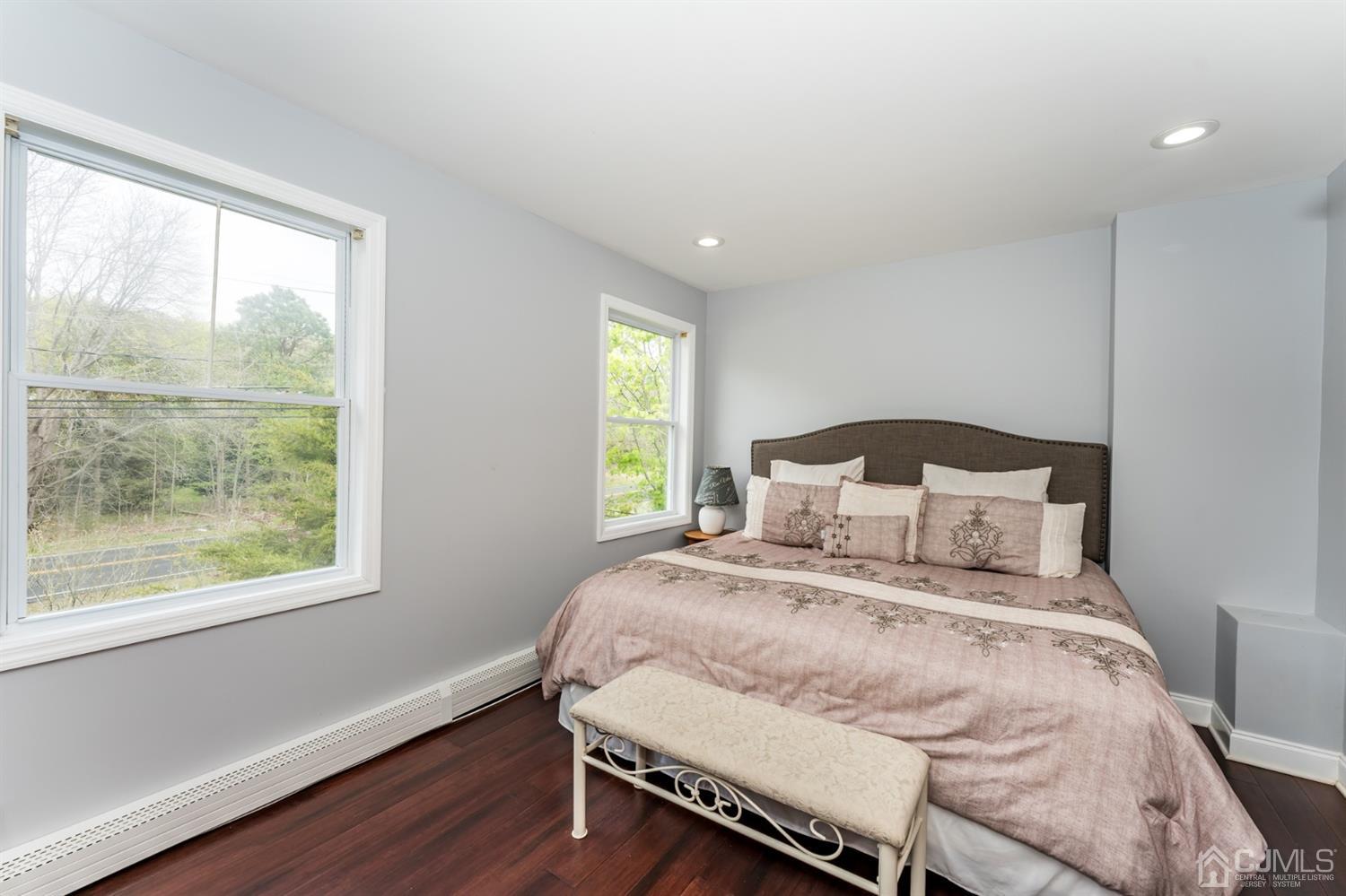 259 Spring Valley Road Morganville, NJ 07751 - Photo 26 of 36 a bedroom with a bed and a window