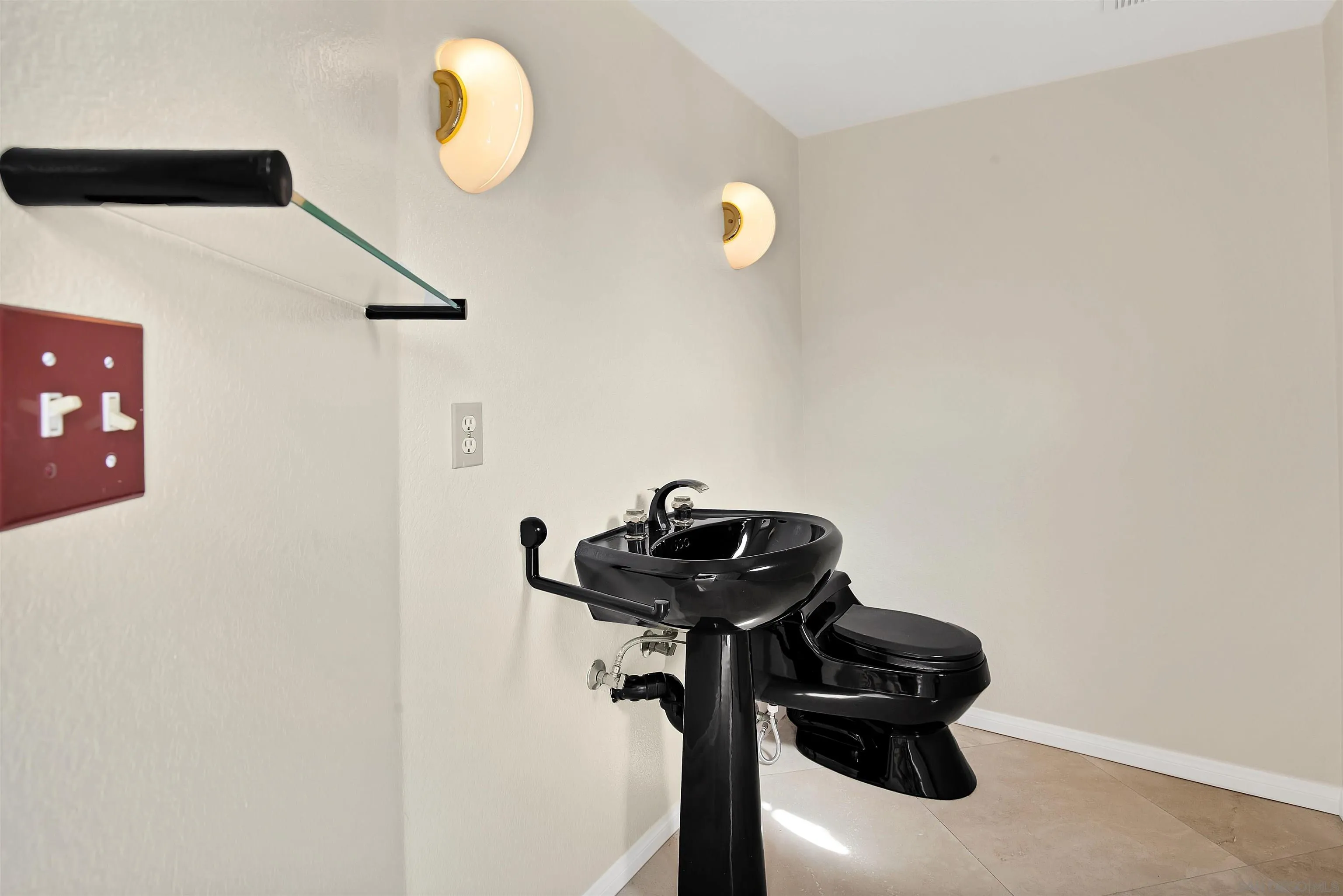415 Marview Drive Solana Beach, CA 92075 - Photo 18 of 53 a bathroom with a sink and a mirror