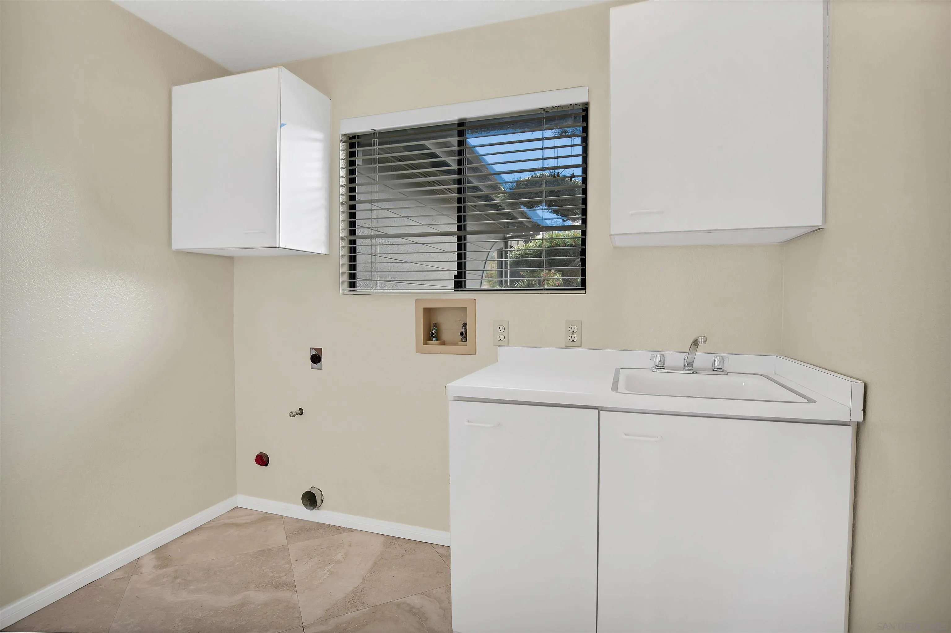 415 Marview Drive Solana Beach, CA 92075 - Photo 19 of 53 a bathroom with a sink and a mirror