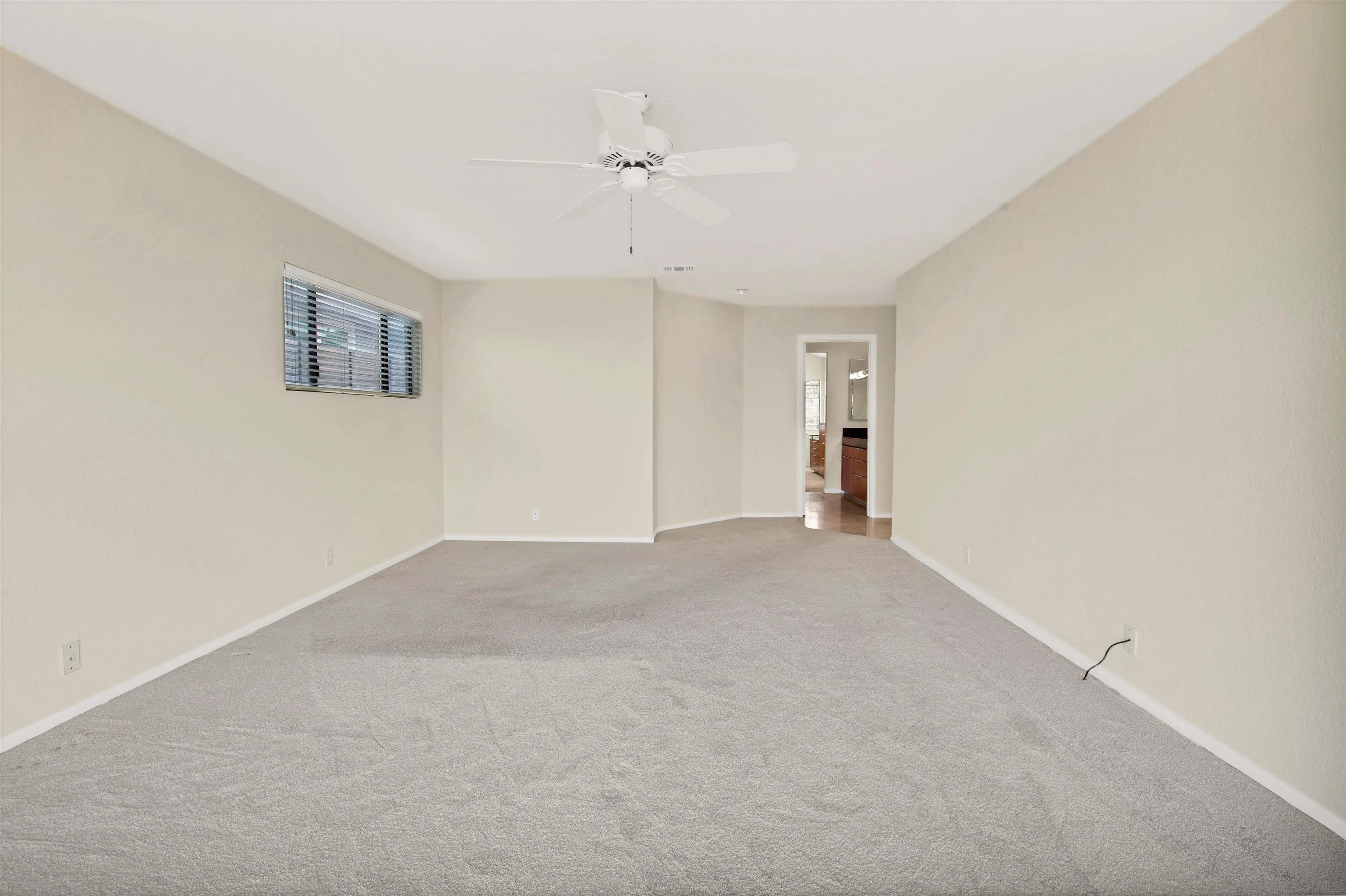 415 Marview Drive Solana Beach, CA 92075 - Photo 24 of 53 a view of an empty room with a ceiling fan