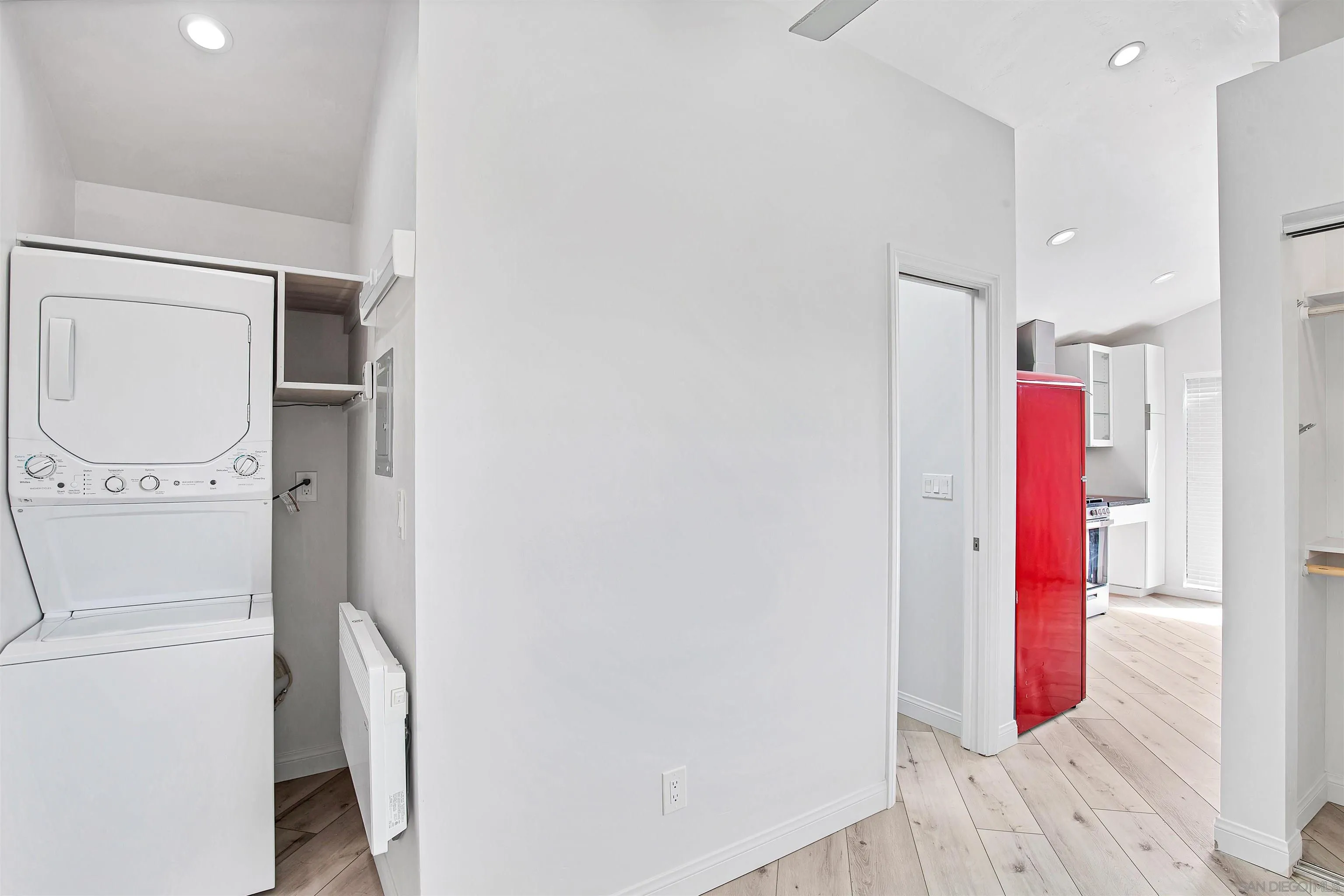 415 Marview Drive Solana Beach, CA 92075 - Photo 38 of 53 a hallway with closet and wooden floor