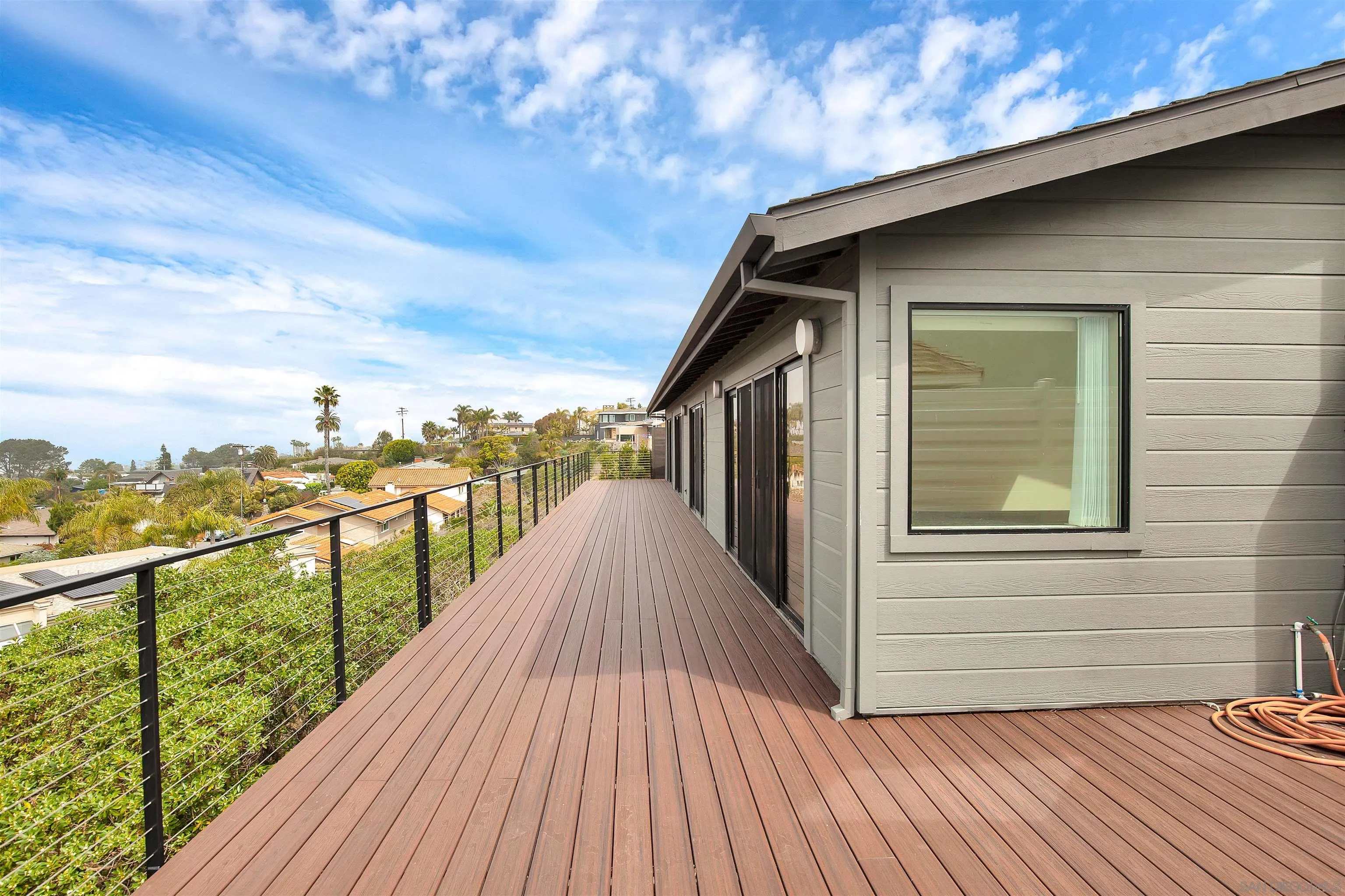 415 Marview Drive Solana Beach, CA 92075 - Photo 42 of 53 a view of a house with wooden deck