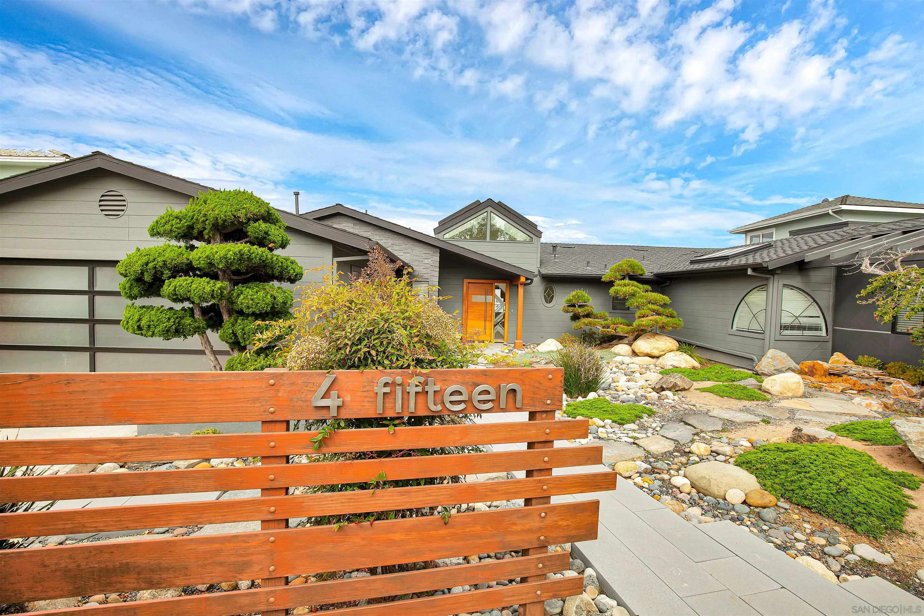 415 Marview Drive Solana Beach, CA 92075 - Photo 5 of 53 a front view of a house with a yard