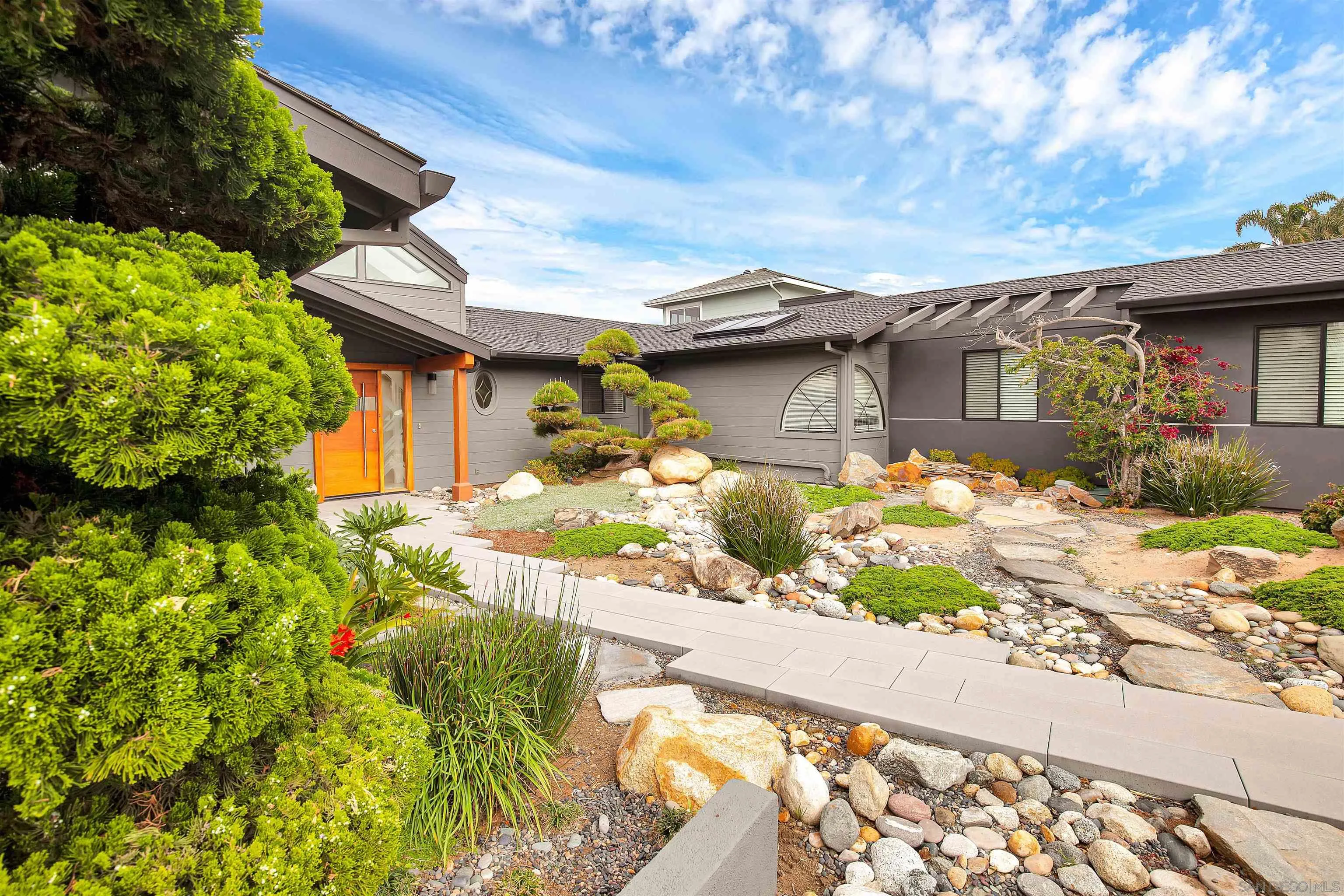 415 Marview Drive Solana Beach, CA 92075 - Photo 7 of 53 a front view of a house with a yard