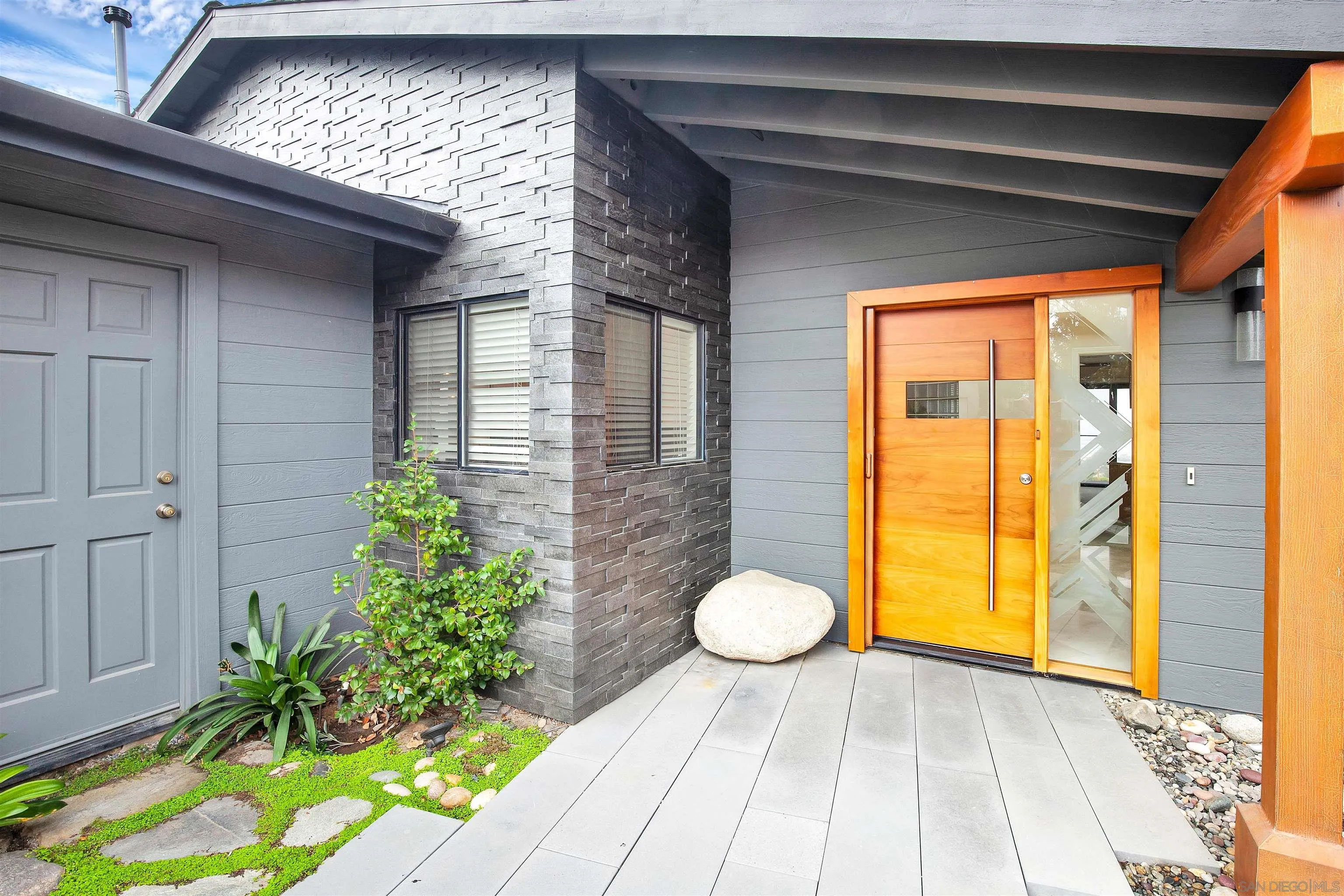 415 Marview Drive Solana Beach, CA 92075 - Photo 9 of 53 a view of a room that has a table and chair in it