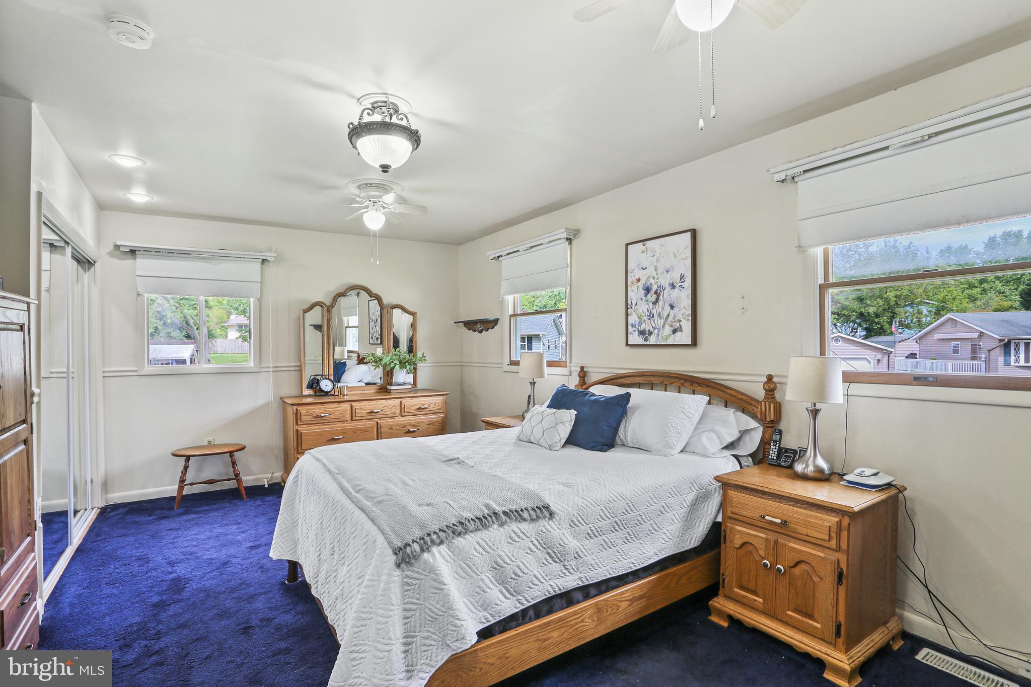 3035 Tarpon Road Riva, MD 21140 - Photo 16 of 31 a bedroom with a bed and wooden floor
