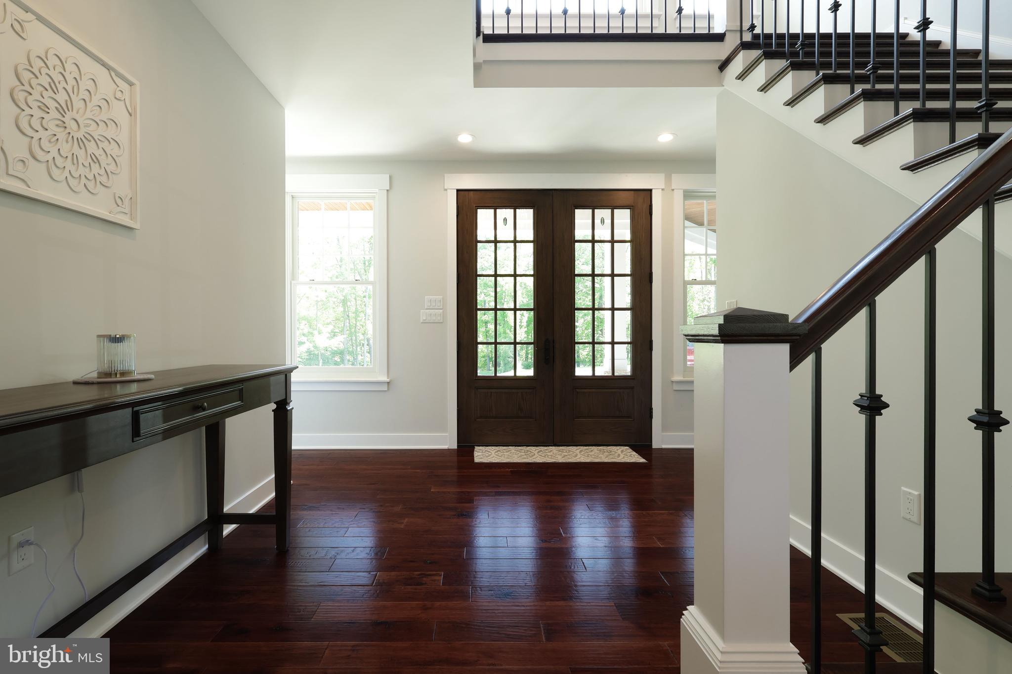 518 Two Mile Road Howard, PA 16841 - Photo 7 of 84 a view of an entryway with wooden floor and door