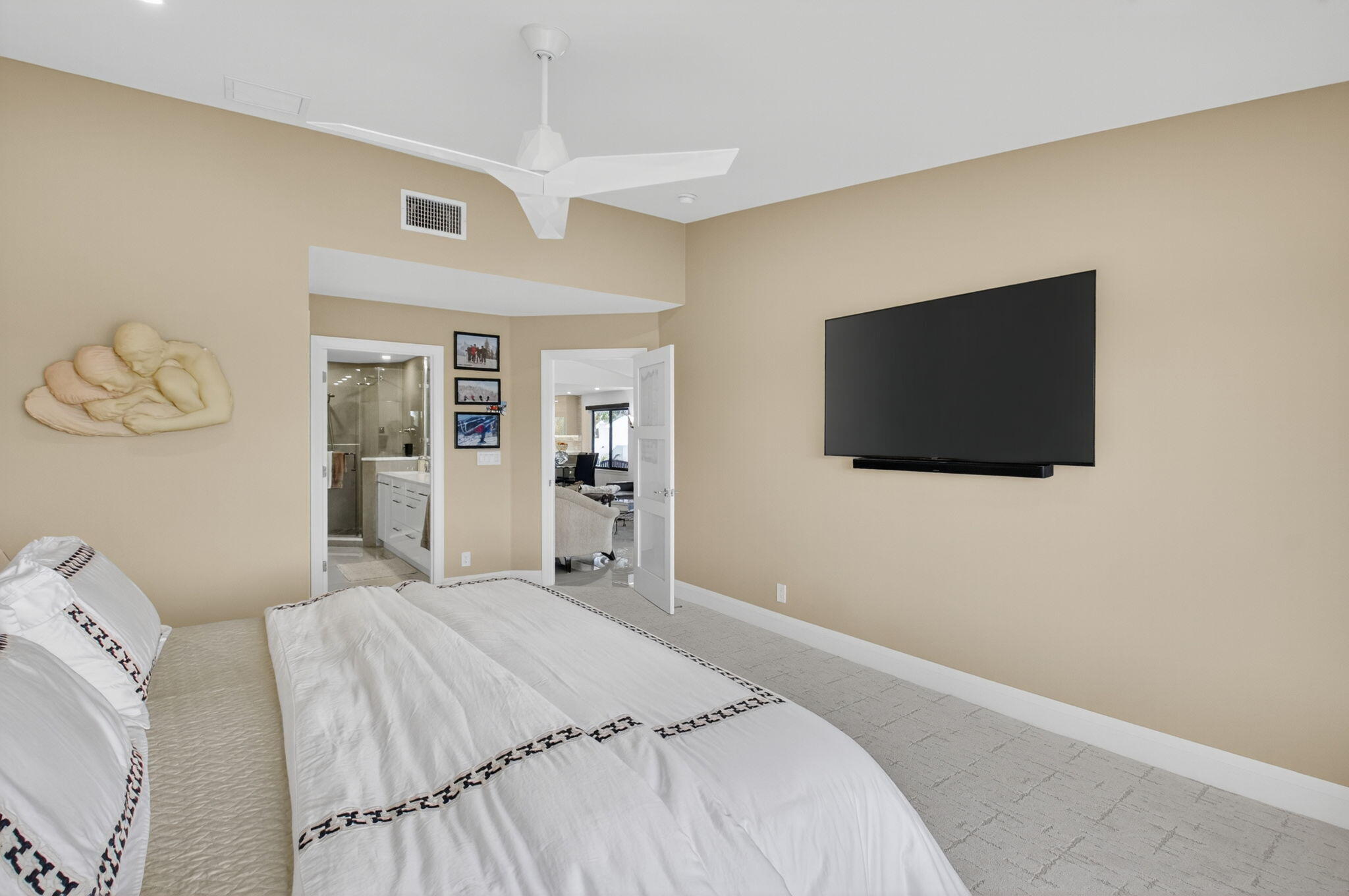 15846 Loch Maree Lane, Unit 2904 Delray Beach, FL 33446 - Photo 28 of 60 a bedroom with a bed and a flat screen tv