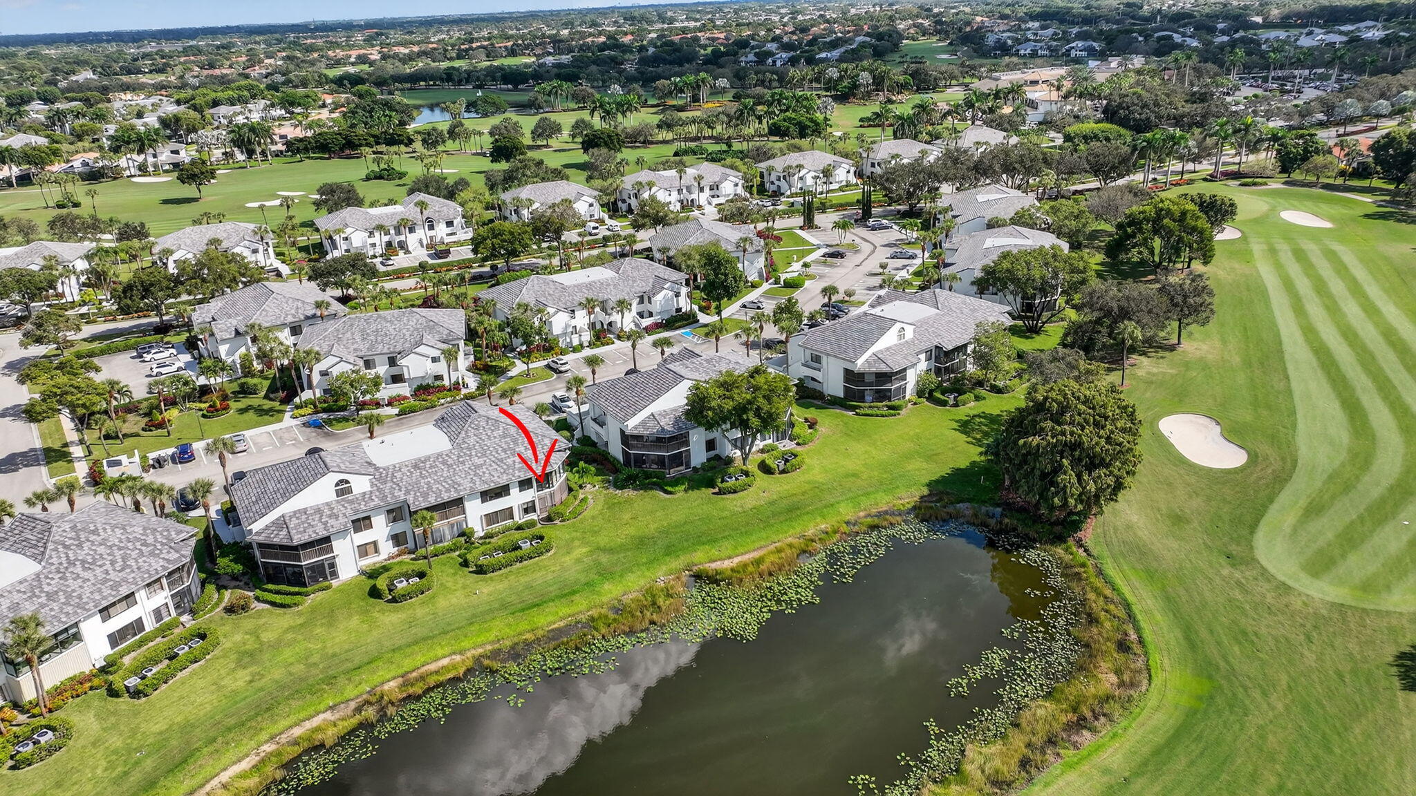 15846 Loch Maree Lane, Unit 2904 Delray Beach, FL 33446 - Photo 44 of 60 an aerial view of a house with a yard and lake view