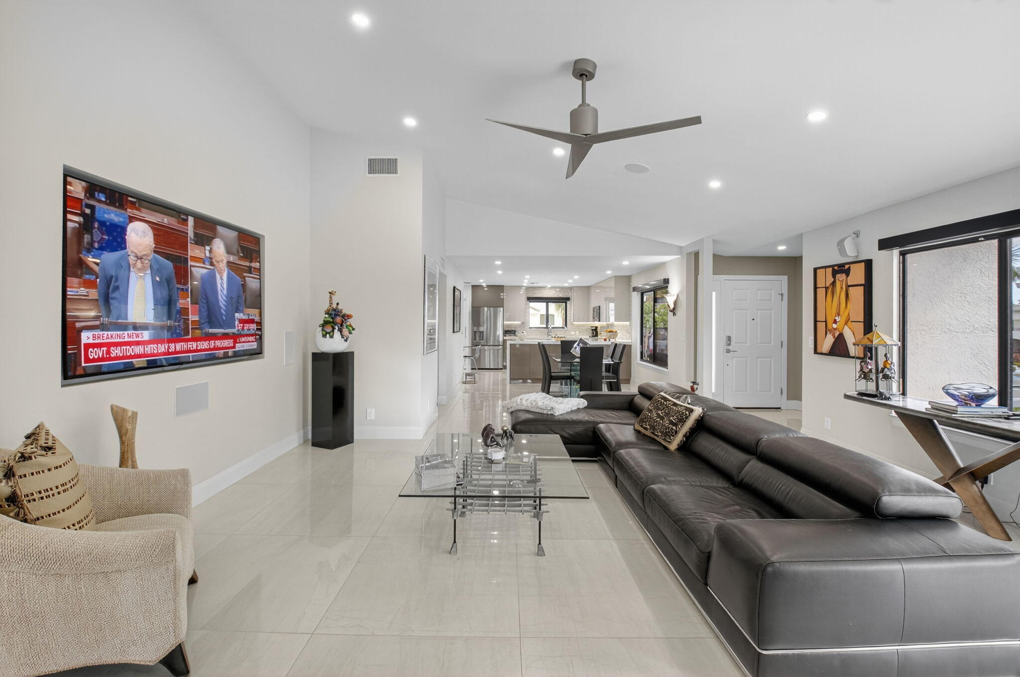 15846 Loch Maree Lane, Unit 2904 Delray Beach, FL 33446 - Photo 8 of 60 a living room with furniture and a ceiling fan