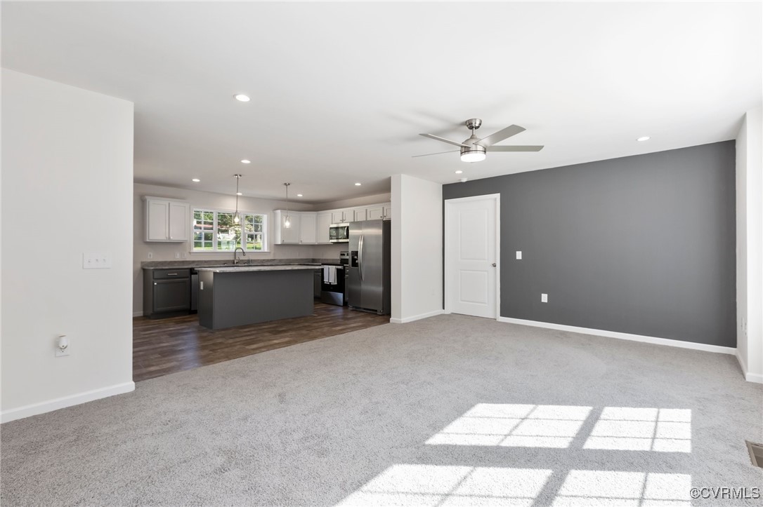 64 Pine Road Louisa, VA 23093 - Photo 9 of 45 a view of a kitchen with a sink and a kitchen counter top space