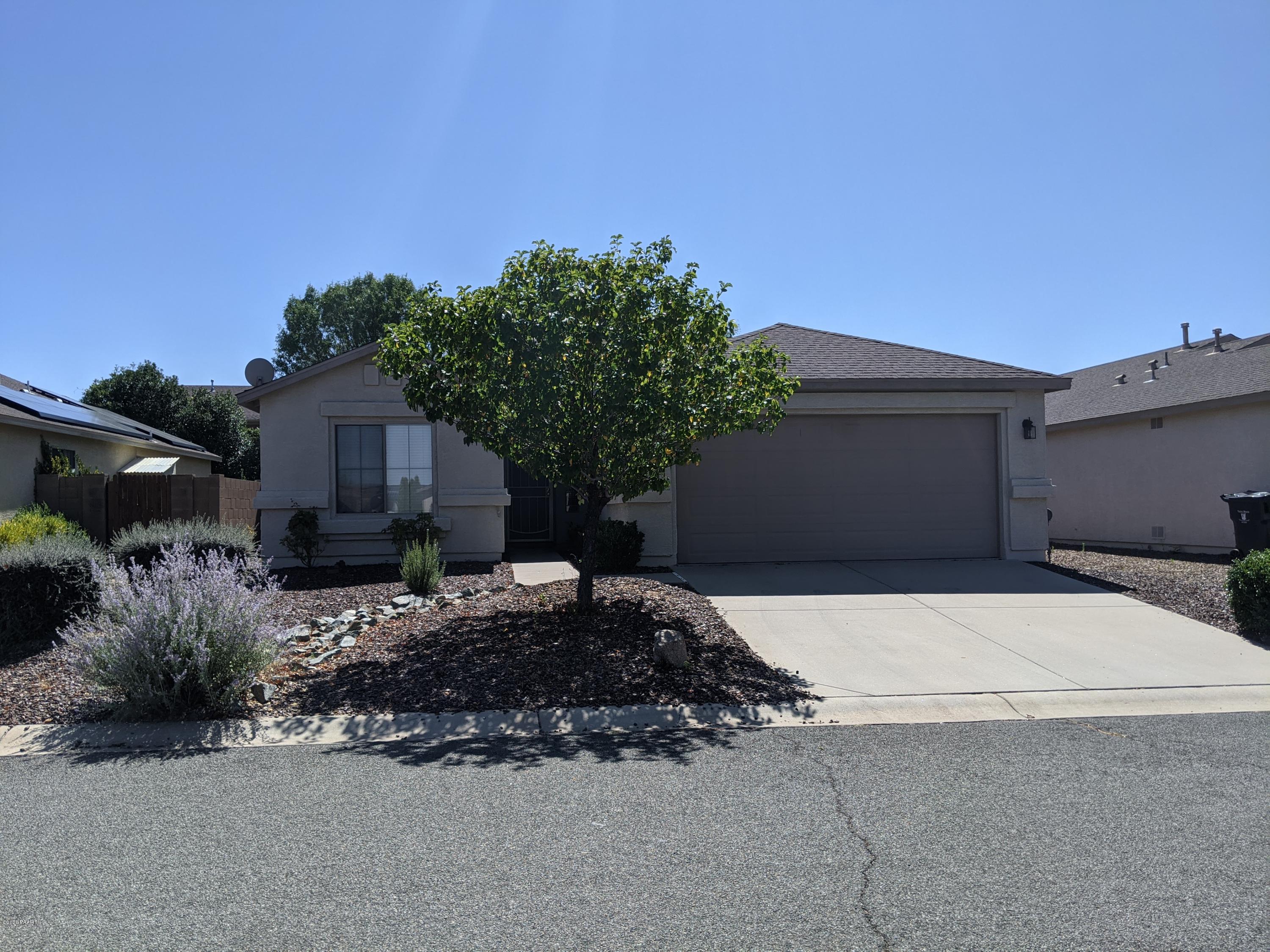 7461 East Plateau Ridge Road Prescott Valley, AZ 86315 - Photo 1 of 1 a house view with a outdoor space