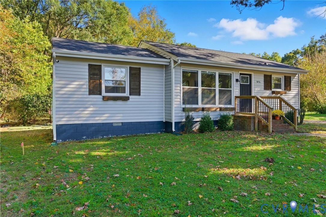 a house view with a garden space