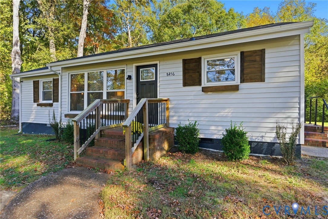 8456 Atlee Road Mechanicsville, VA 23116 - Photo 2 of 28 a house view with a backyard space