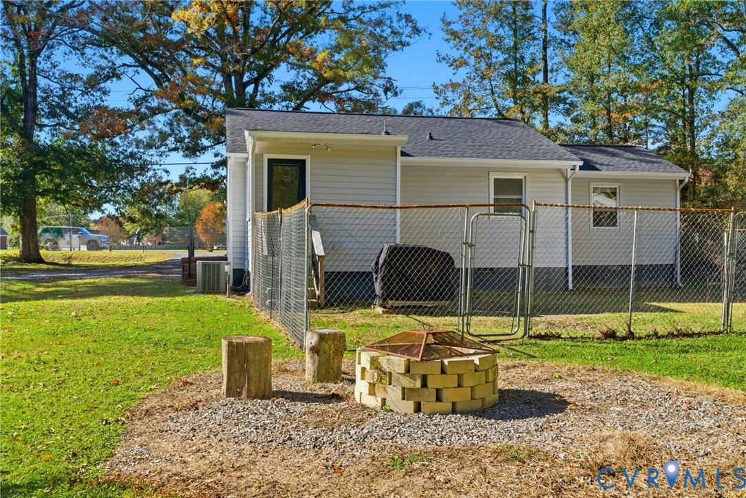 8456 Atlee Road Mechanicsville, VA 23116 - Photo 24 of 28 a view of a house with backyard