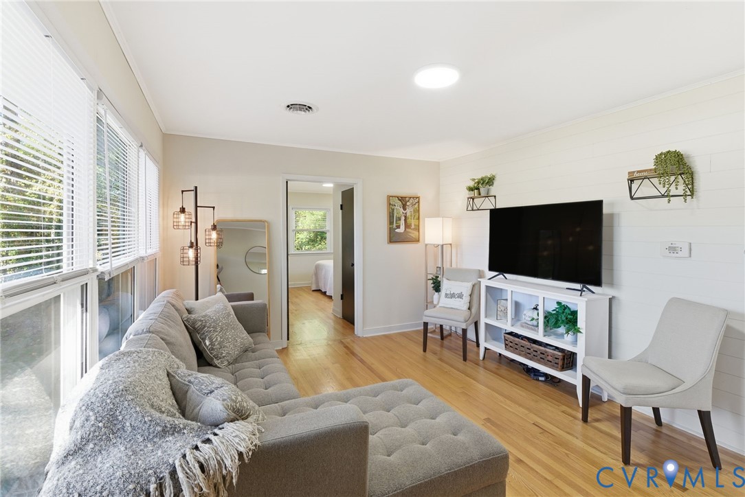 8456 Atlee Road Mechanicsville, VA 23116 - Photo 4 of 28 a living room with furniture and a flat screen tv