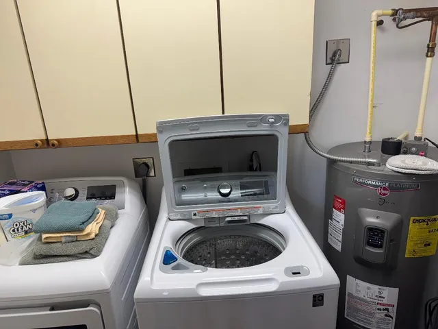 a utility room with dryer and washer