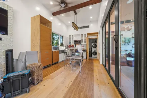 a view of a living room and a flat screen tv