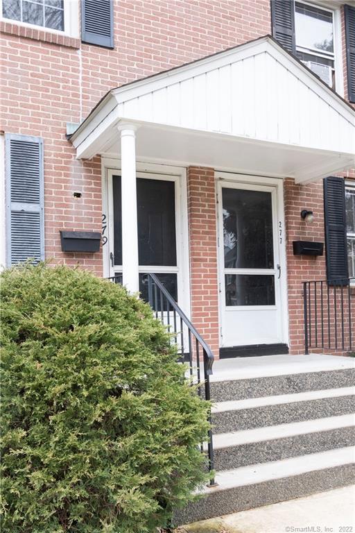 279 Sylvan Knoll Road Stamford, CT 06902 - Photo 1 of 1 a front view of a house with a small yard