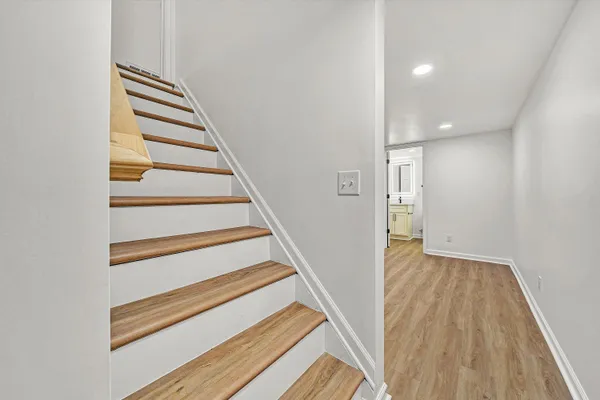 a view of entryway with wooden floor