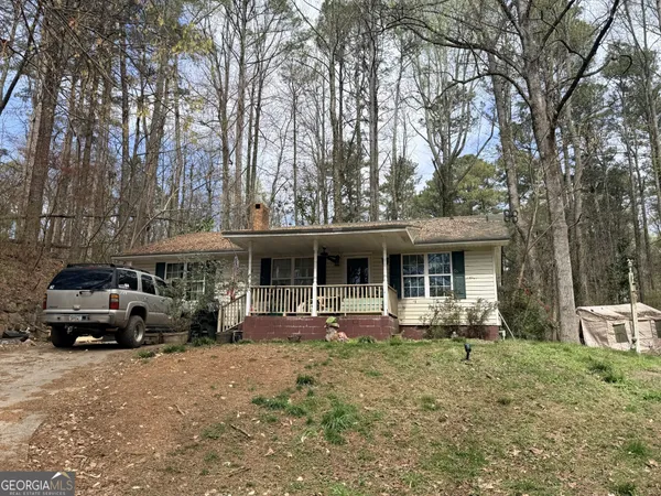 a car parked in front of a house