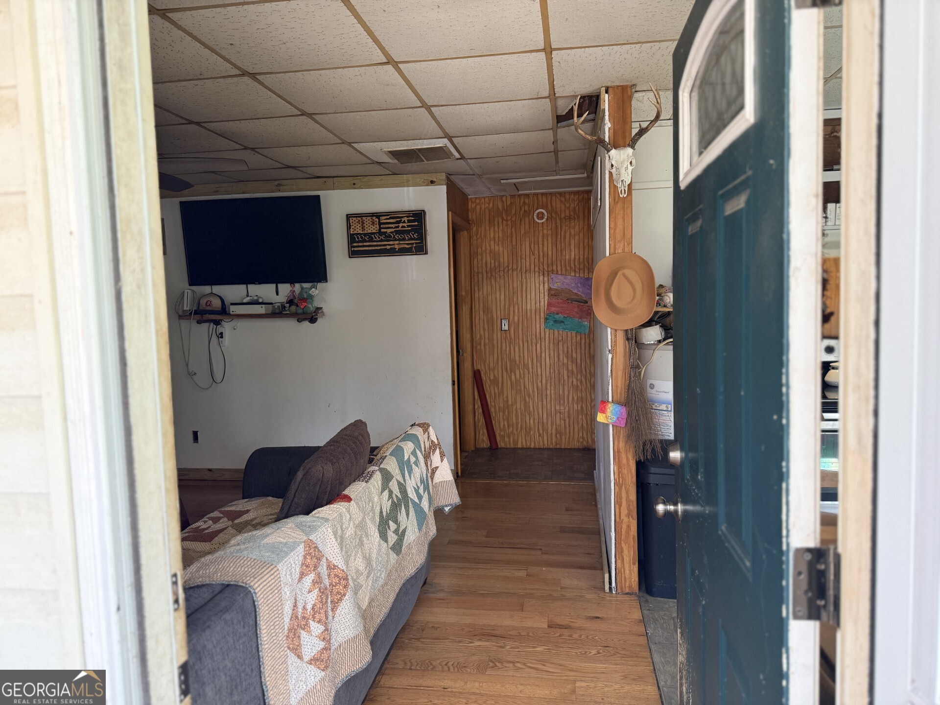 235 Nature Path Dallas, GA 30132 - Photo 4 of 9 a bedroom with a bed and a flat tv screen