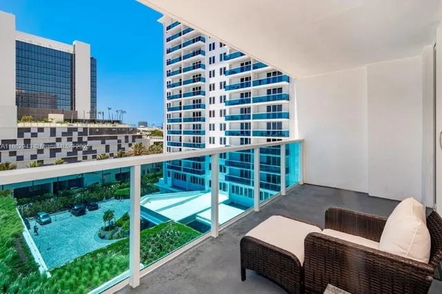 a view of a city with tall buildings