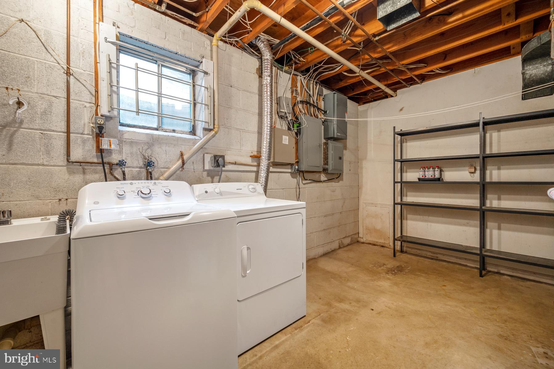 7320 Range Road Alexandria, VA 22306 - Photo 12 of 46 Large laundry/utility room with storage