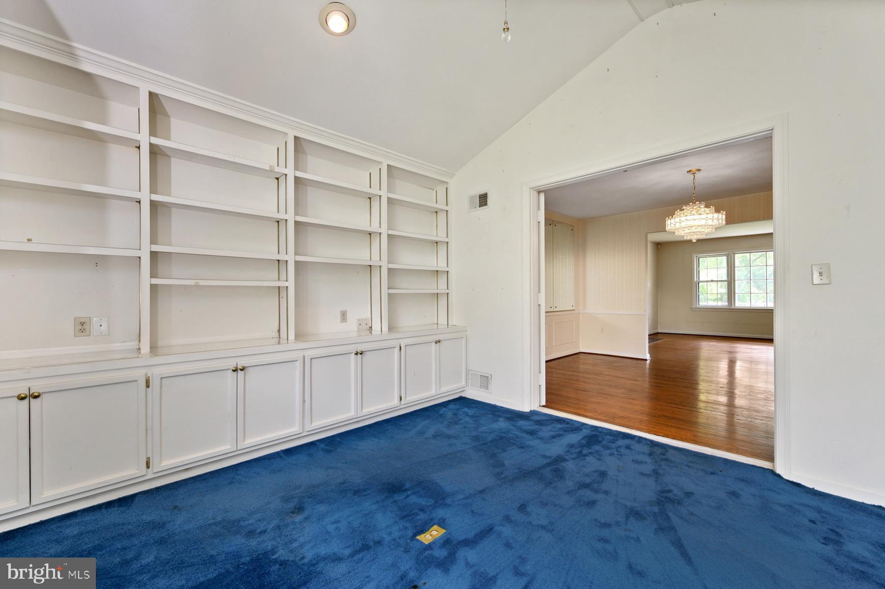 7320 Range Road Alexandria, VA 22306 - Photo 31 of 46 Sunroom addition with built-in shelves