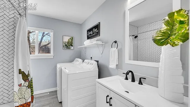 a bathroom with a sink toilet and vanity