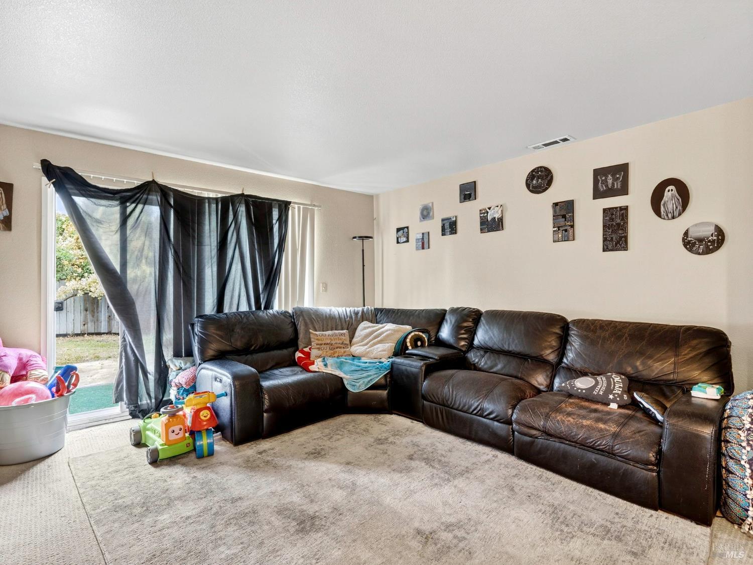 100-102 West 8th Street Santa Rosa, CA 95401 - Photo 18 of 32 a living room with furniture and a wooden floor
